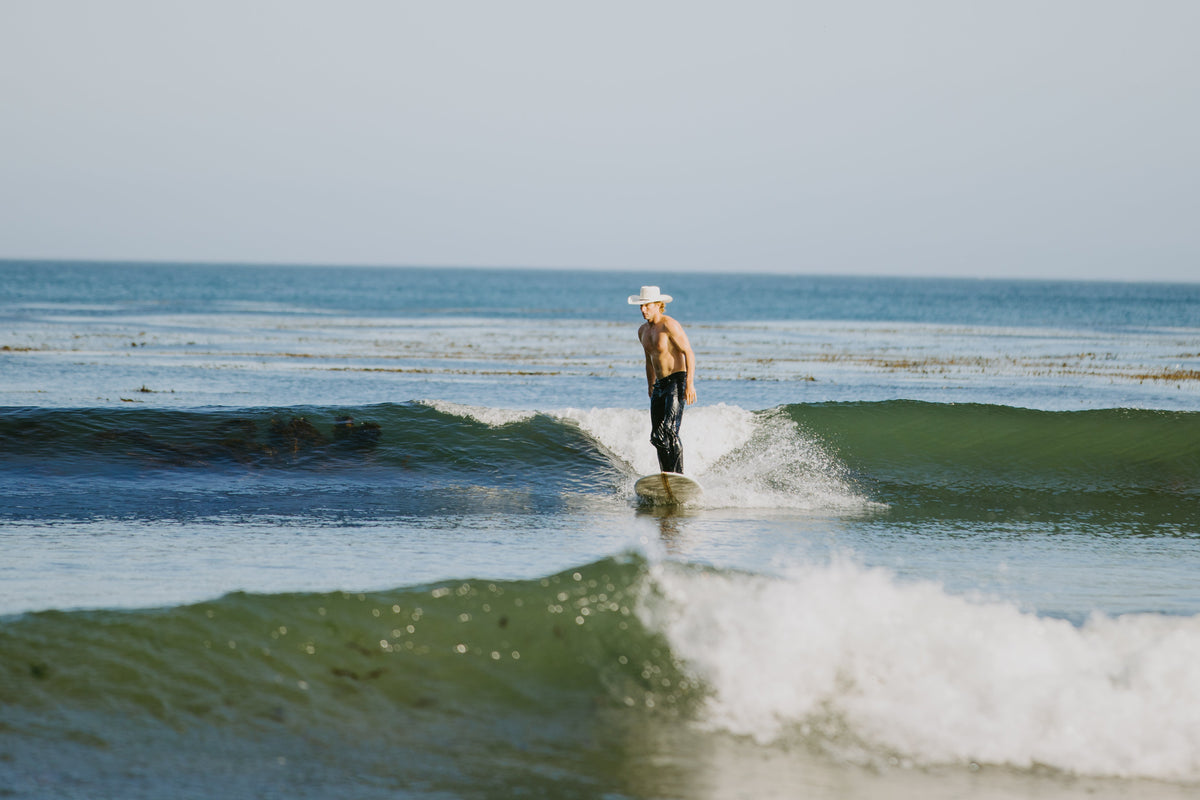 Rider on horseback in the surf